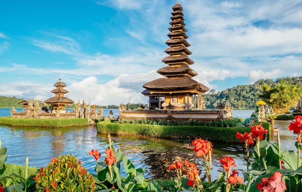 Pura Ulun Danu Bratan, Hindu temple surrounded by flowers on Bratan lake is a major Shivaite and water temple in Bali, Indonesia